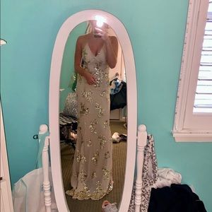 Stunner Boutique Gown! Beautifully creme color with gold detailing